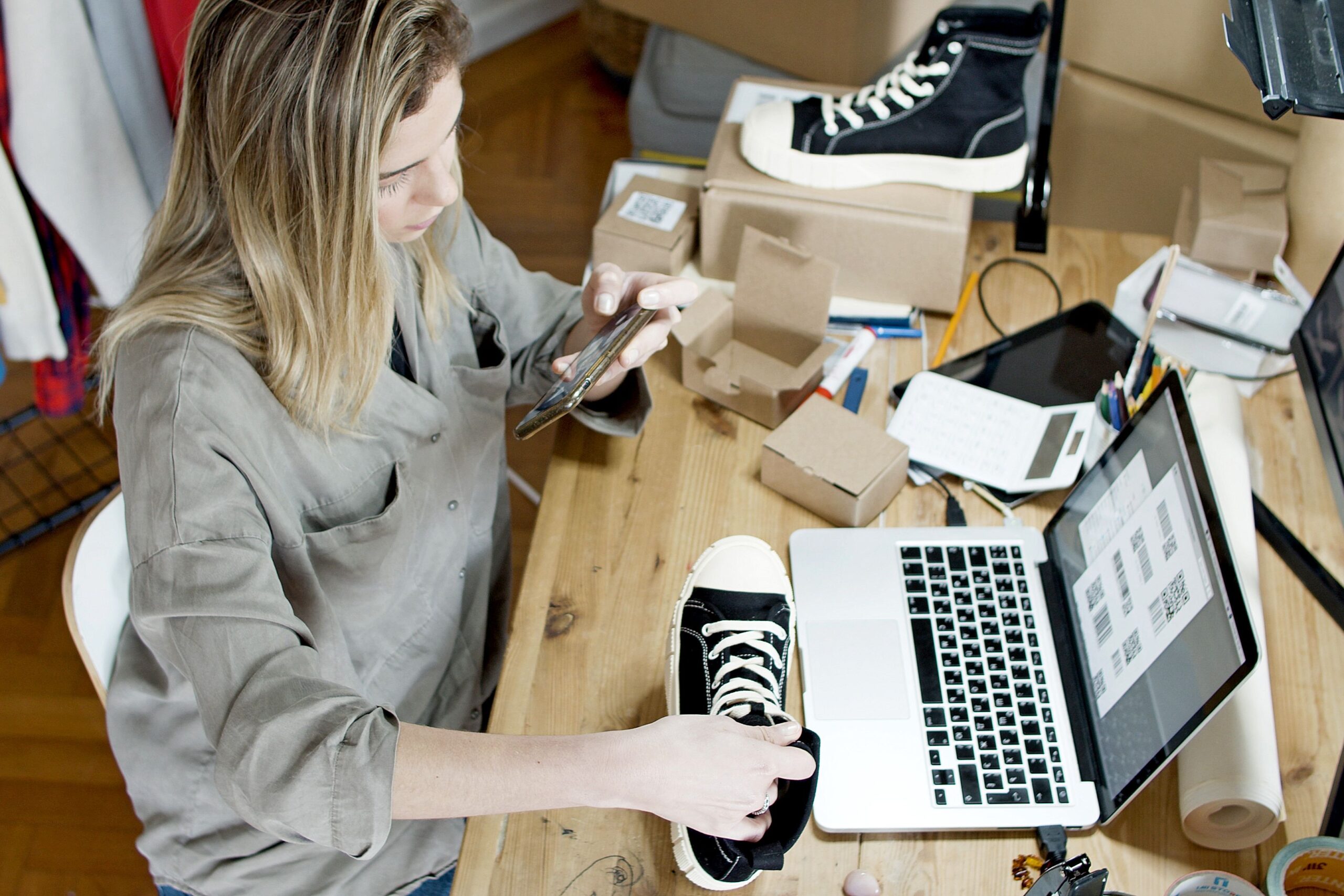Small business owner photographing a product for a WhatsApp catalog